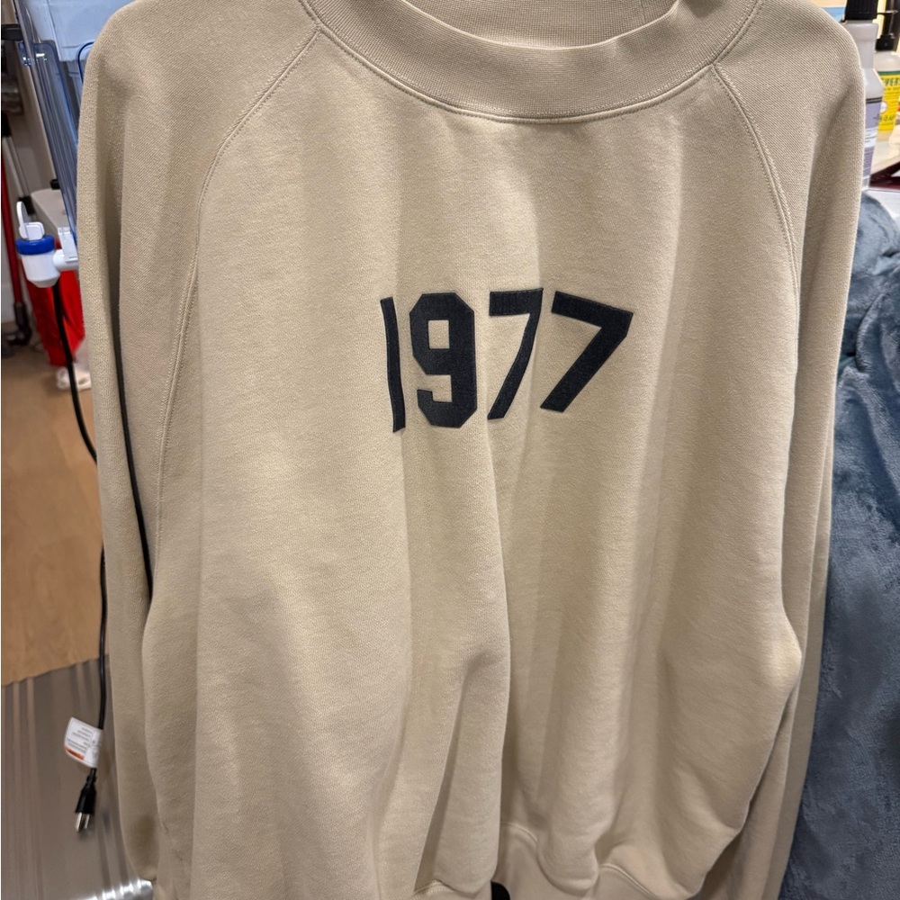 Essentials Cream Crewneck Sweater with 1977 Graphic